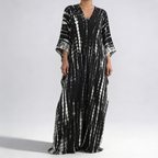 Vue détaillée du bas et de l'ourlet du caftan maxi