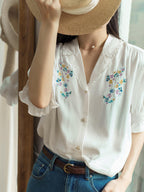 Blouse broderie florale col V manches courtes pour femme