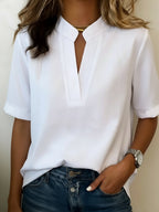 Blouse col chemise avec détail doré