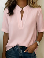 Blouse col chemise avec détail doré