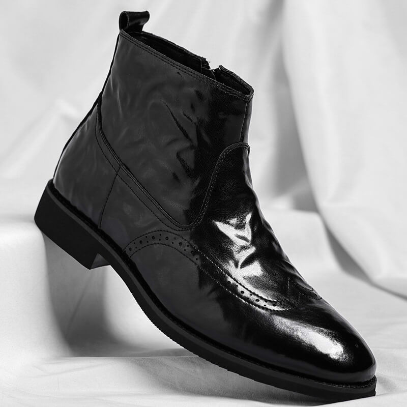 Bottines brogue détails perforés finition polie noir pour homme