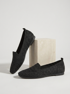 Chaussures plates brillantes à enfiler noir pour femme