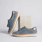 Chaussures slip-on perforées à pompons compensées bleu pour femme