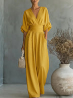 Combinaison cache-cœur ceinturée jambes larges jaune pour femme