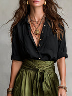 Ensemble chemise noire et jupe midi verte ceinturée pour femme