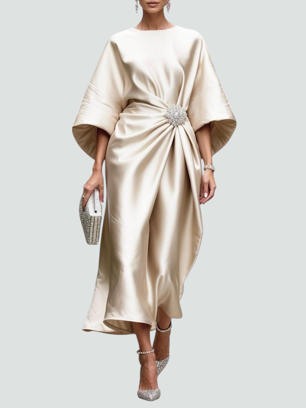 Détail de la base de la robe et de l'ourlet asymétrique