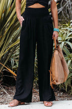 Pantalon large fluide taille smockée noir pour femme