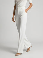 Pantalon large taille haute avec plis blanc pour femme