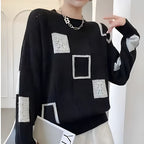 Pull col rond motif graphique bicolore noir pour femme