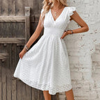 Robe courte en broderie anglaise smockée