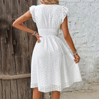 Robe courte en broderie anglaise smockée