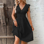 Robe courte en broderie anglaise smockée