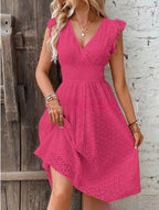 Robe courte en broderie anglaise smockée
