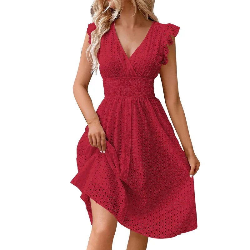 Robe courte en broderie anglaise smockée