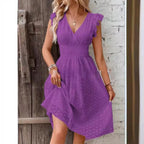 Robe courte en broderie anglaise smockée