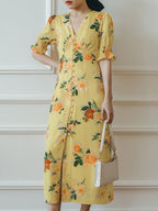 Robe longue fleurie jaune col V manches courtes pour femme