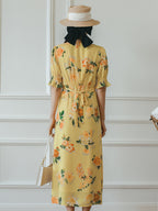 Robe longue fleurie jaune col V manches courtes pour femme