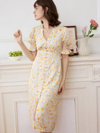 Robe longue fleurie jaune col V manches courtes pour femme