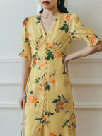 Robe longue fleurie jaune col V manches courtes pour femme