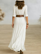 Robe longue plissée col V boutonnée