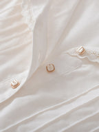 Robe midi brodée à buste plissé pour femme