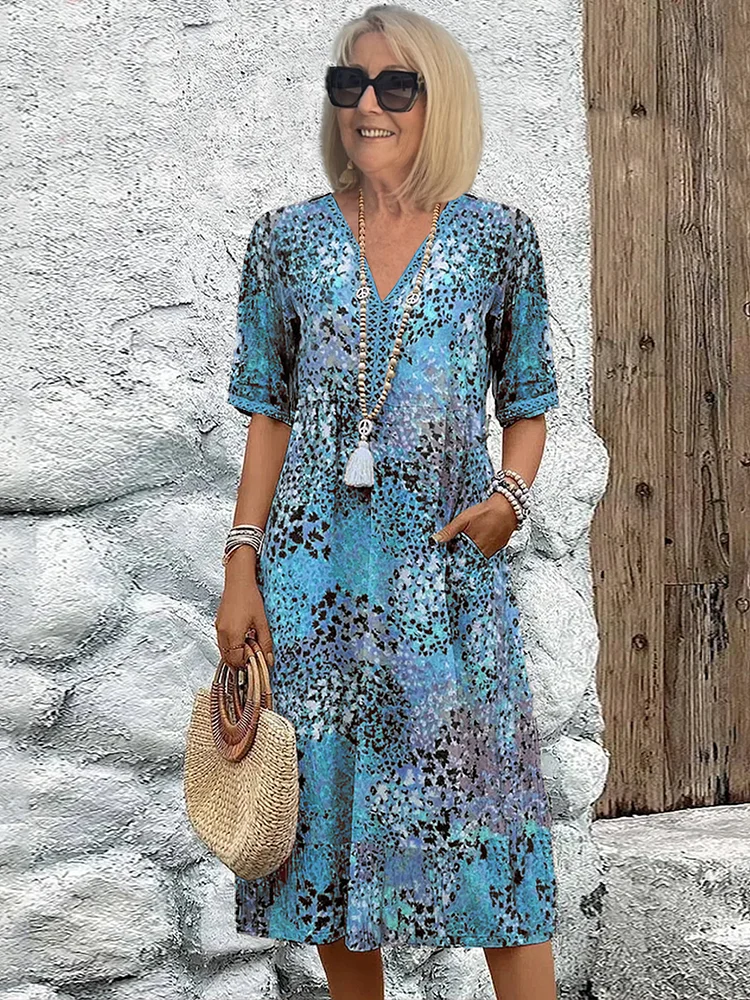 Robe midi fleurie à col V et manches courtes pour femme