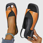 Sandales plates à brides croisées bicolores orange pour femme