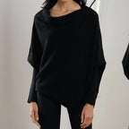 Top poncho asymétrique col bateau manches longues noir pour femme