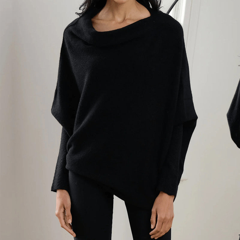 Top poncho asymétrique col bateau manches longues noir pour femme