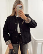 Veste courte matelassée à manchettes léopard noir pour femme
