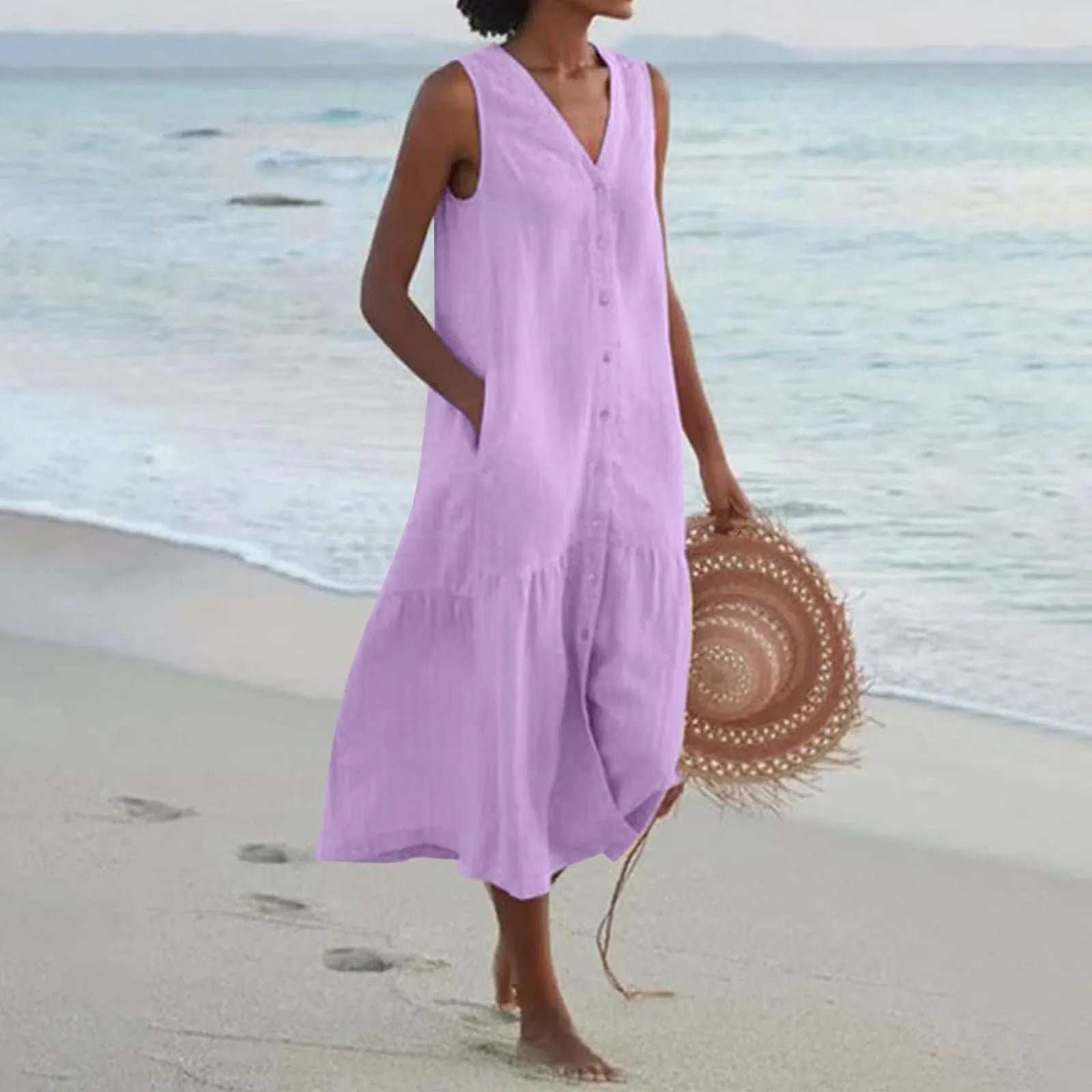 Robe midi en mouvement montrant la fluidité du tissu blanc