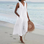 Robe midi fluide blanche avec col V et volants étagés, vue de face