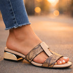 Mule en cuir imprimé serpent avec talon bloc, vue de profil