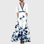 Femme portant robe maxi fleurie col V manches kimono, vue de face