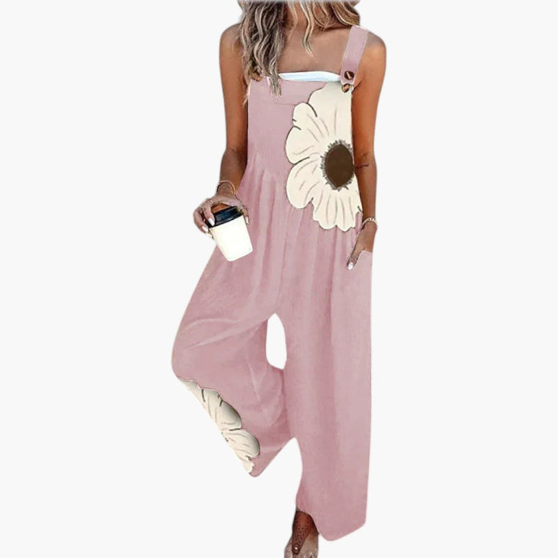 Combinaison florale en pied, jambe large mise en valeur en mouvement
